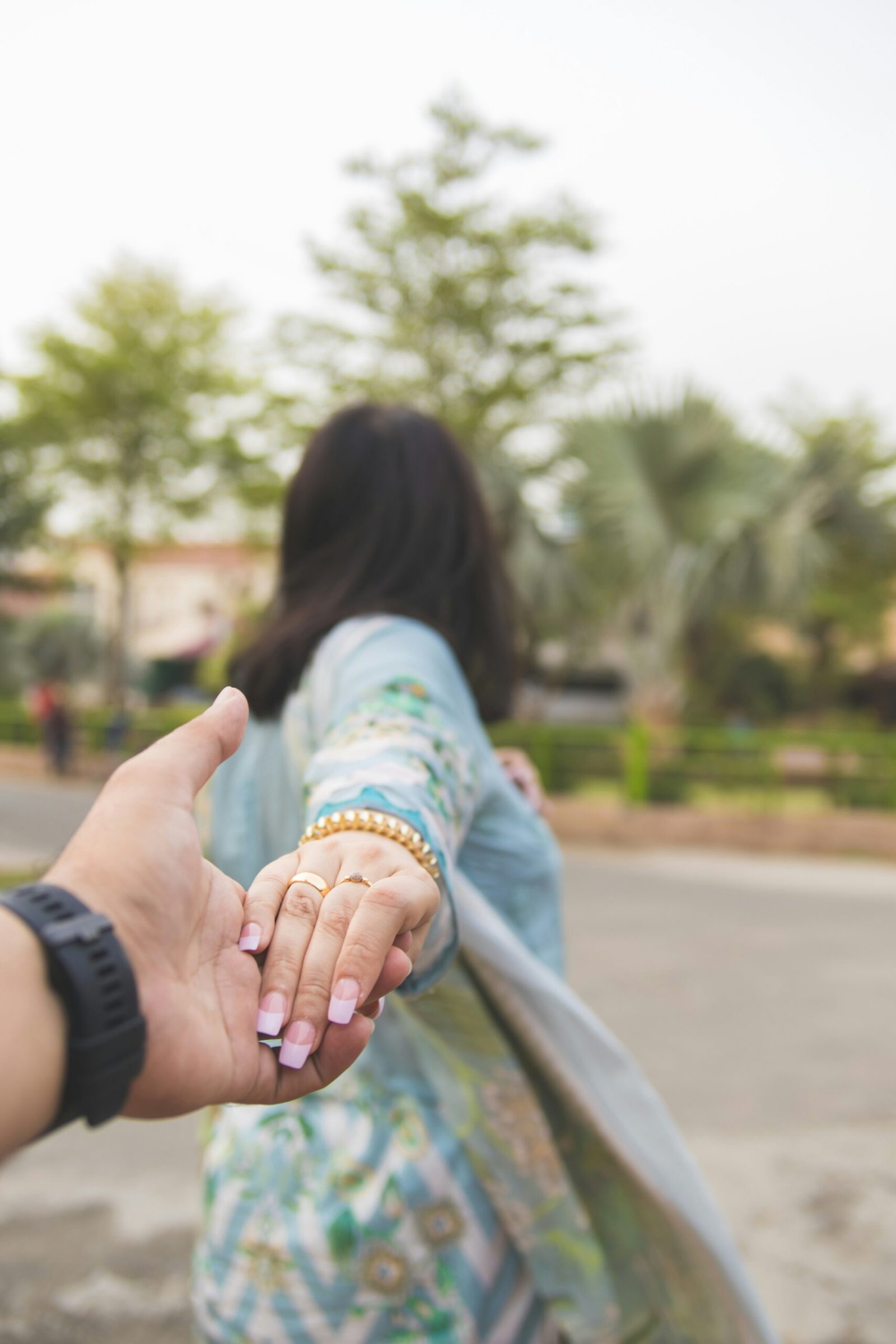 a person holding the hand of another person